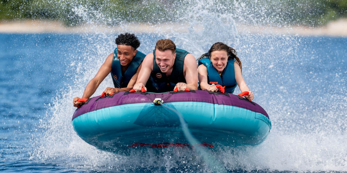 purple and teal towable tube
